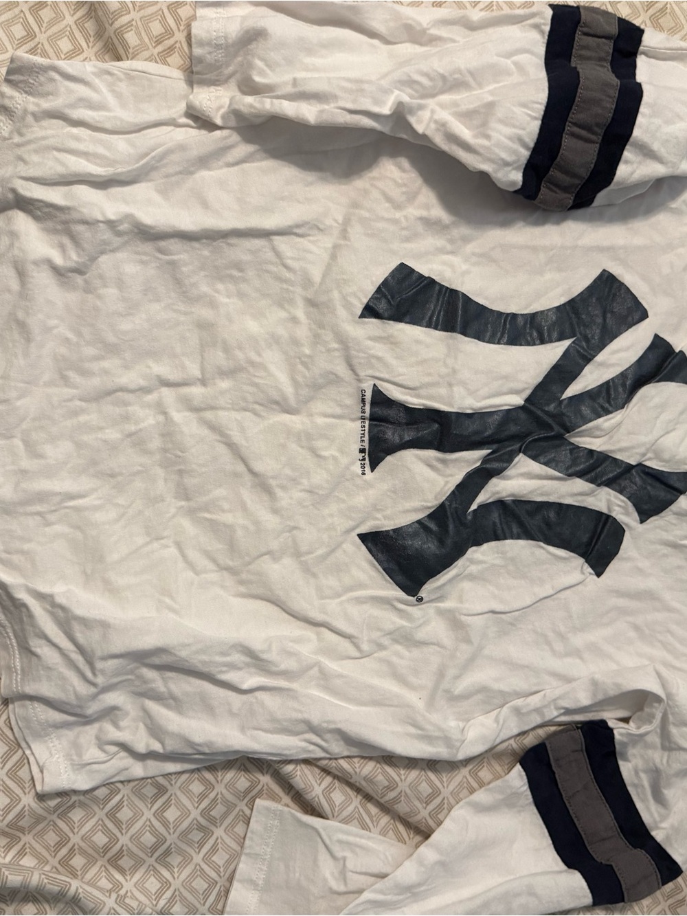 Genuine Merchandise White Tee with Red and Navy Logo